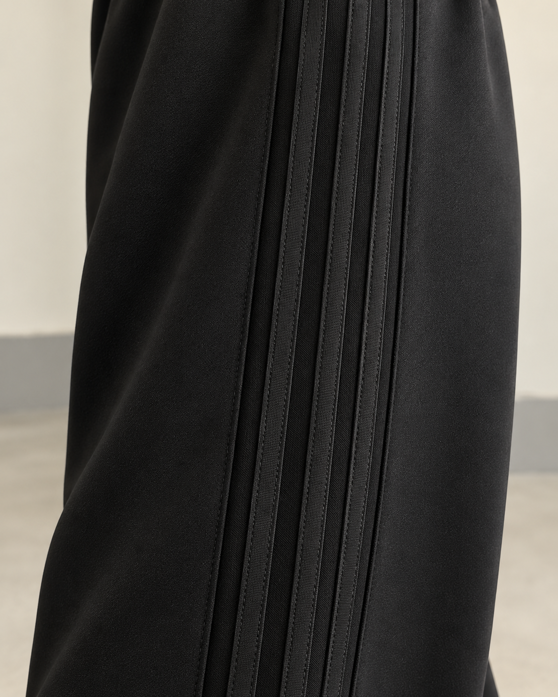 Black high-waisted side-seam wide-leg trousers — side-seam